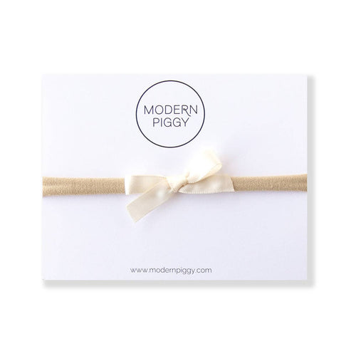 Modern Piggy Ivory | Mini Ribbon Bow - Nylon Headband - Flying Ryno